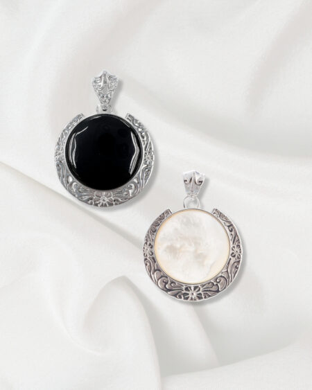 Carved Silver Pendant